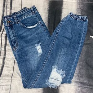 Large , blue ripped jeans , waistband stretches